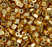 Бисер "ТОНО" рубка 2.2мм HEXAGON 11/0 №557 золото (25г)